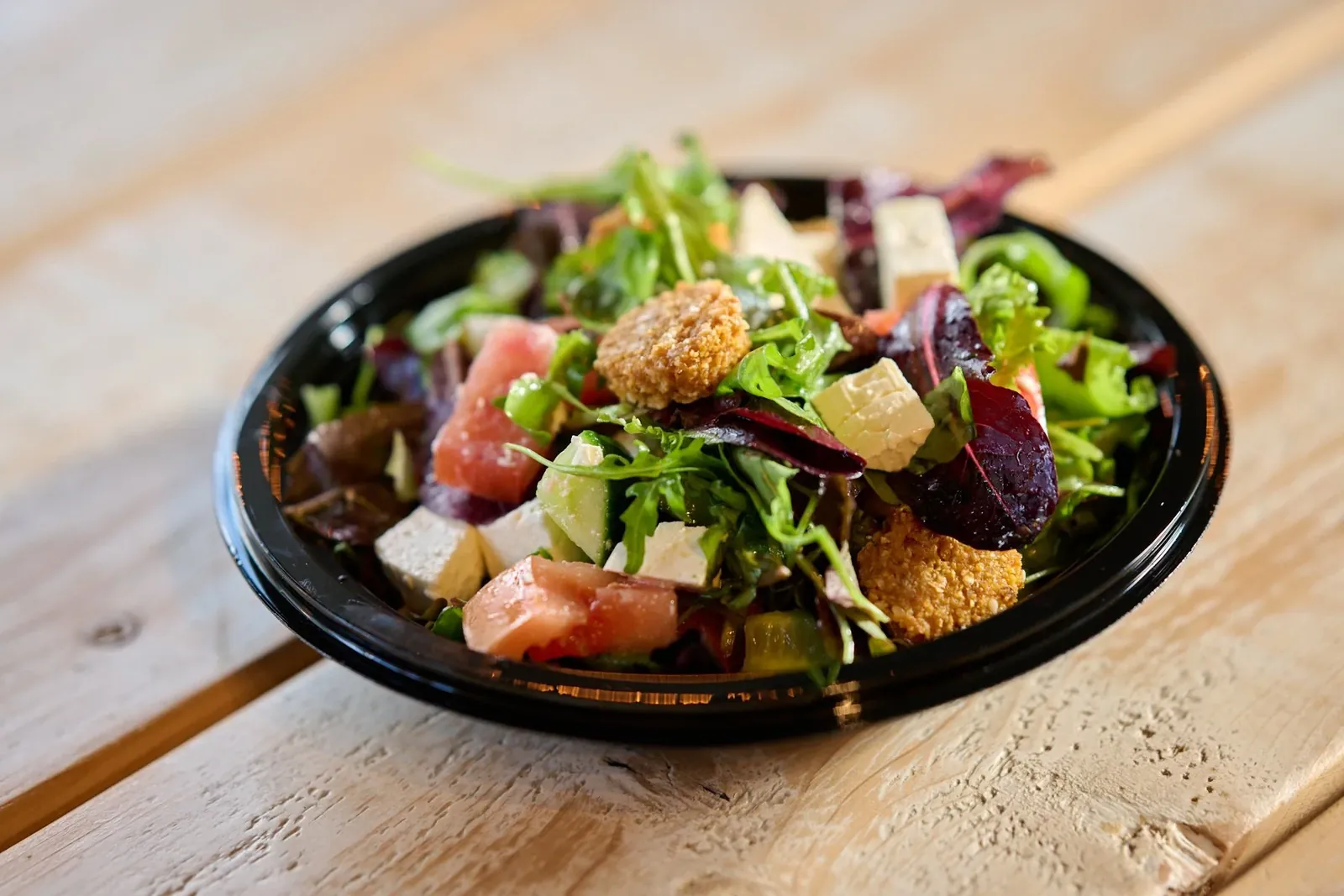 Fresh Napata salad with greens, feta and crisp tamia